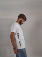 White oversized tee with Don't Ctrl Everything side print and No Risk no story back print Lascialo Essere No Risk Drop 01