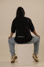 Black oversized tee with wine glass and travel icons graphic Lascialo Essere Wine Time Drop 01