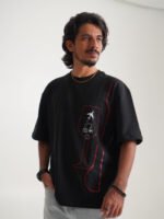Black oversized tee with wine glass graphic and travel