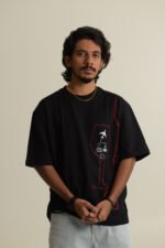 Black oversized tee with wine glass graphic and travel