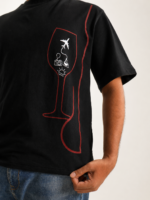 Black oversized tee with wine glass graphic and travel